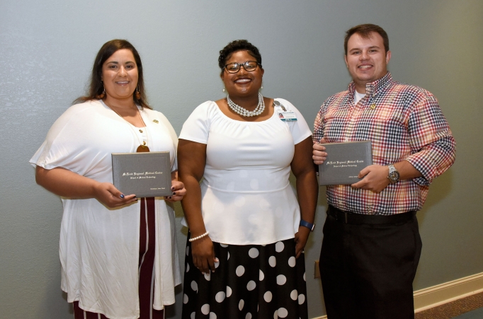 McLeod School of Medical Technology Program Director April Orange posing with two 2019 graduates