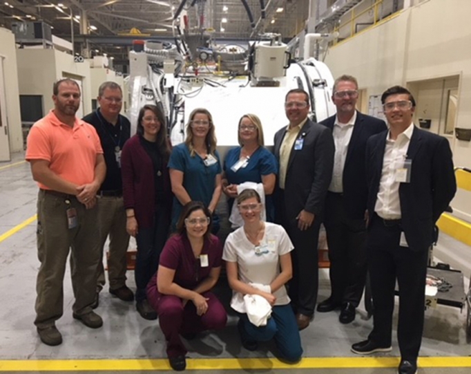 McLeod Radiology staff and GE Healthcare employees posing together after a tour of the MRI Plant in Florence