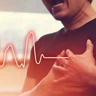 A man holding his chest in pain with a heart rate monitor graph flatlining